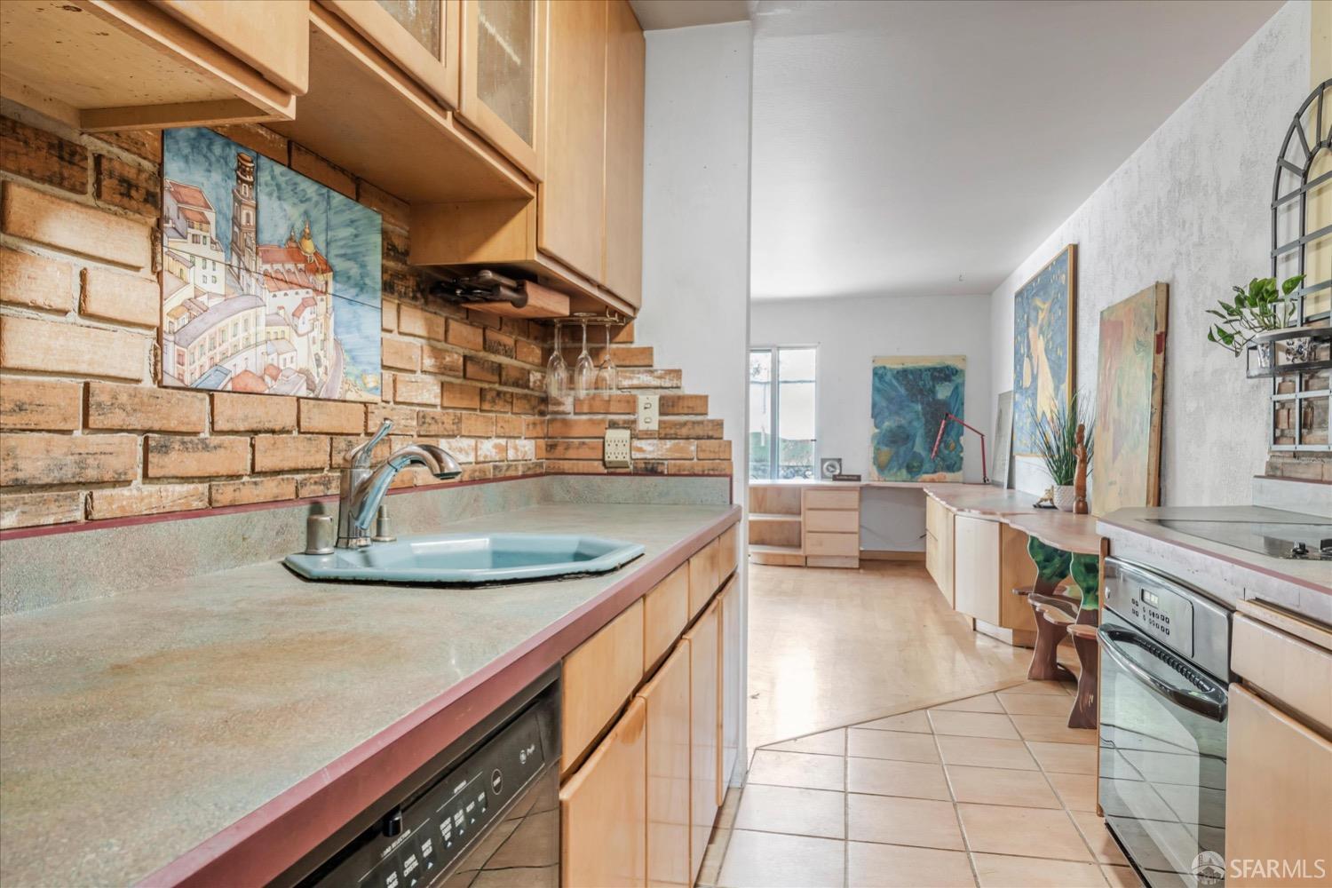 20 Inca Lane, Unit 2 San Francisco, CA 94115 - Photo 12 of 36 a kitchen with a sink and a stove top oven