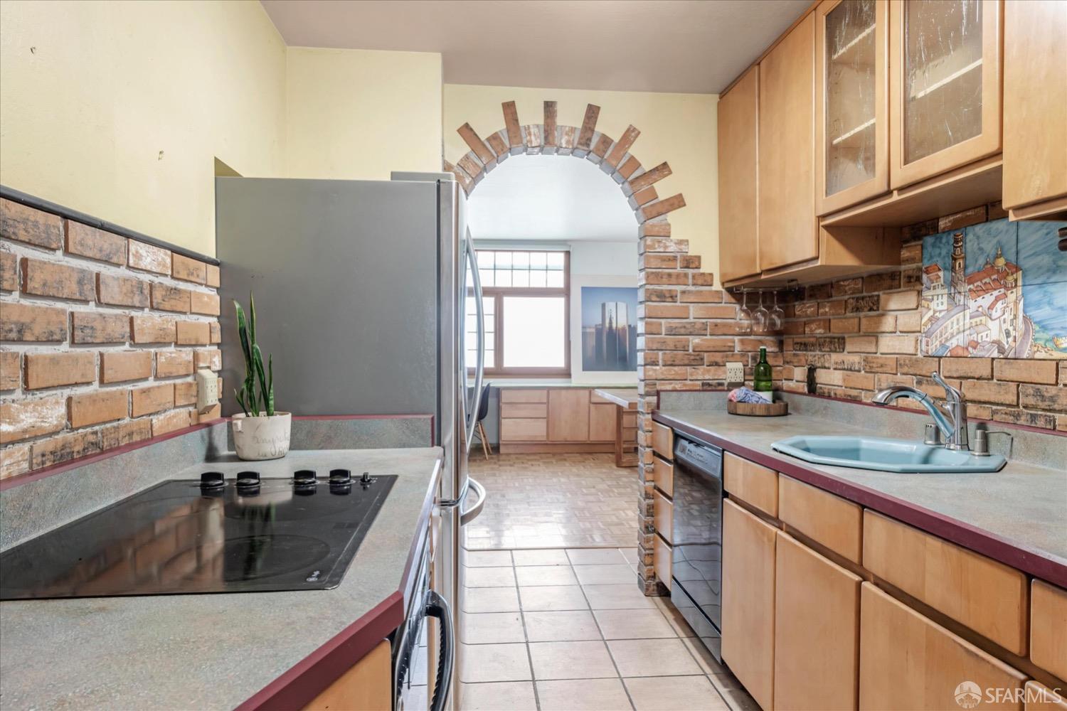20 Inca Lane, Unit 2 San Francisco, CA 94115 - Photo 13 of 36 a kitchen with a sink stove and cabinets