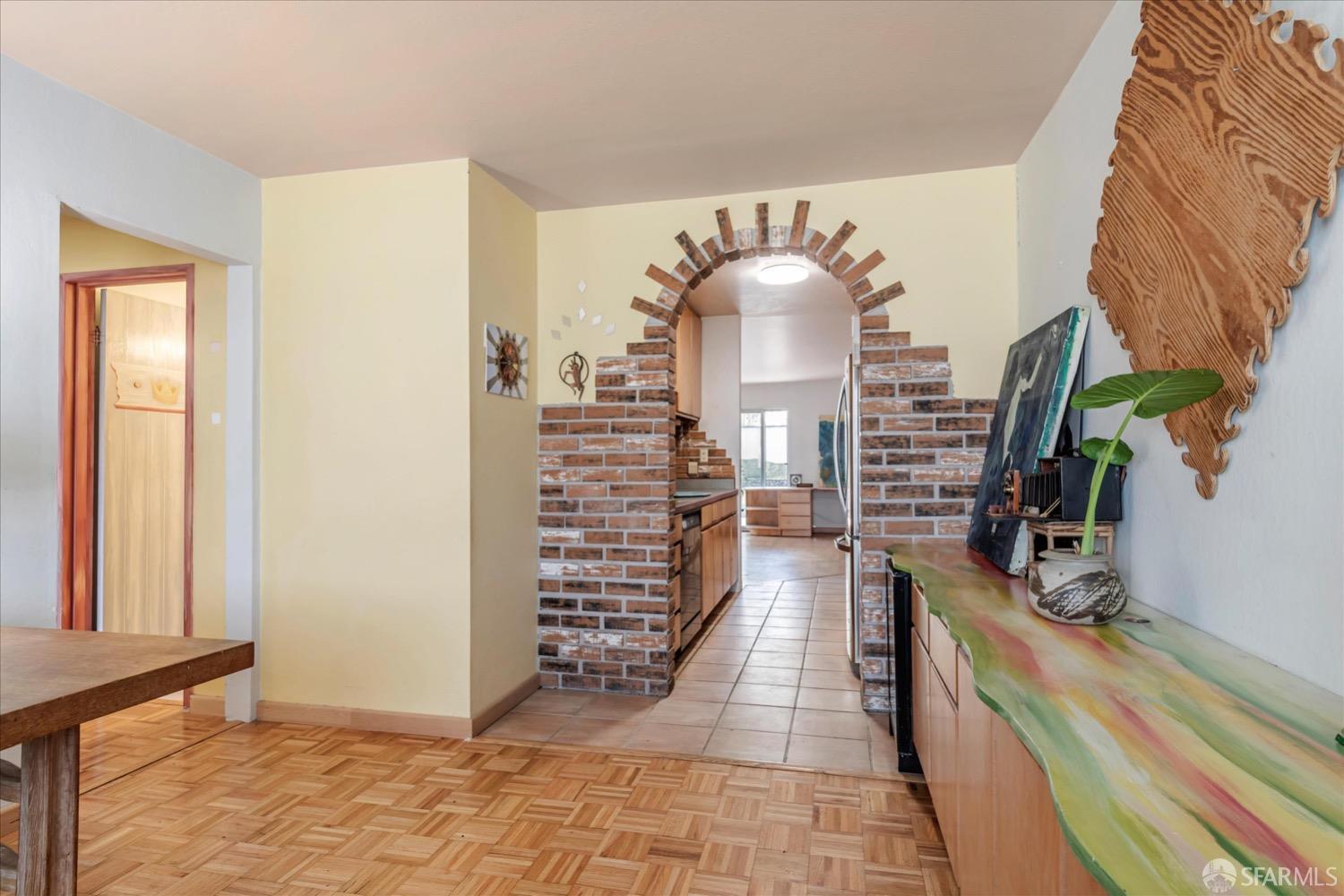 20 Inca Lane, Unit 2 San Francisco, CA 94115 - Photo 17 of 36 a kitchen with counter top space and wooden floor