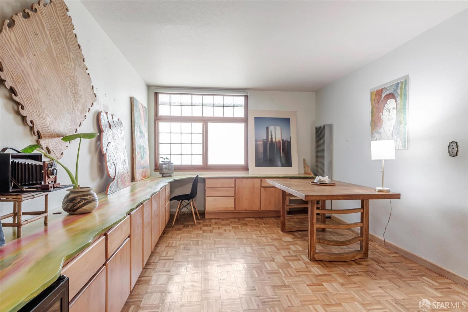 20 Inca Lane, Unit 2 San Francisco, CA 94115 - Photo 19 of 36 a large white room with chairs a desk and a window