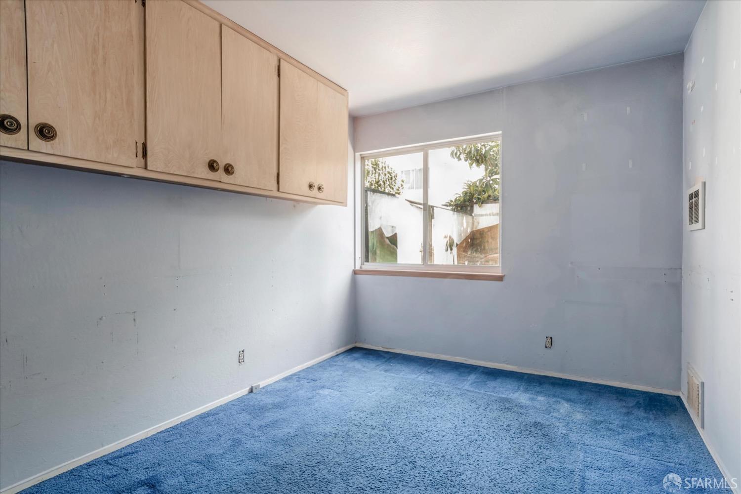 20 Inca Lane, Unit 2 San Francisco, CA 94115 - Photo 20 of 36 a view of an empty room with window and cabinet