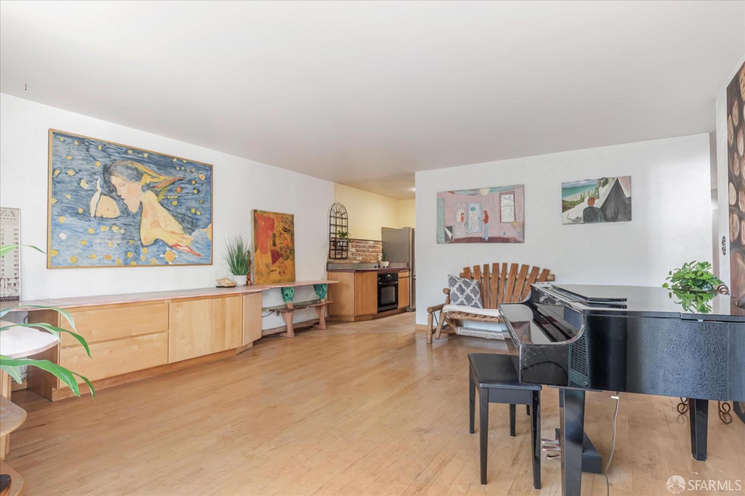 20 Inca Lane, Unit 2 San Francisco, CA 94115 - Photo 7 of 36 a living room with furniture and paintings on the wall