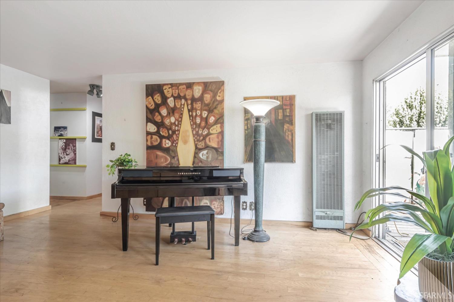 20 Inca Lane, Unit 2 San Francisco, CA 94115 - Photo 9 of 36 a living room with furniture and large windows