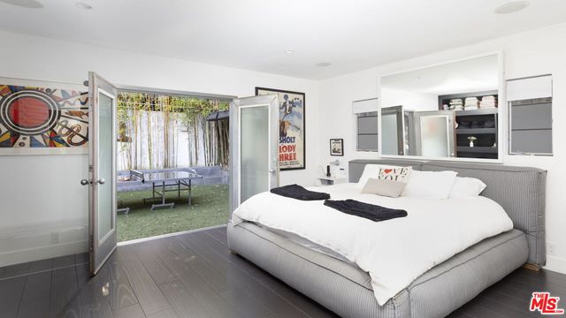 a view of a dining room with furniture and toys