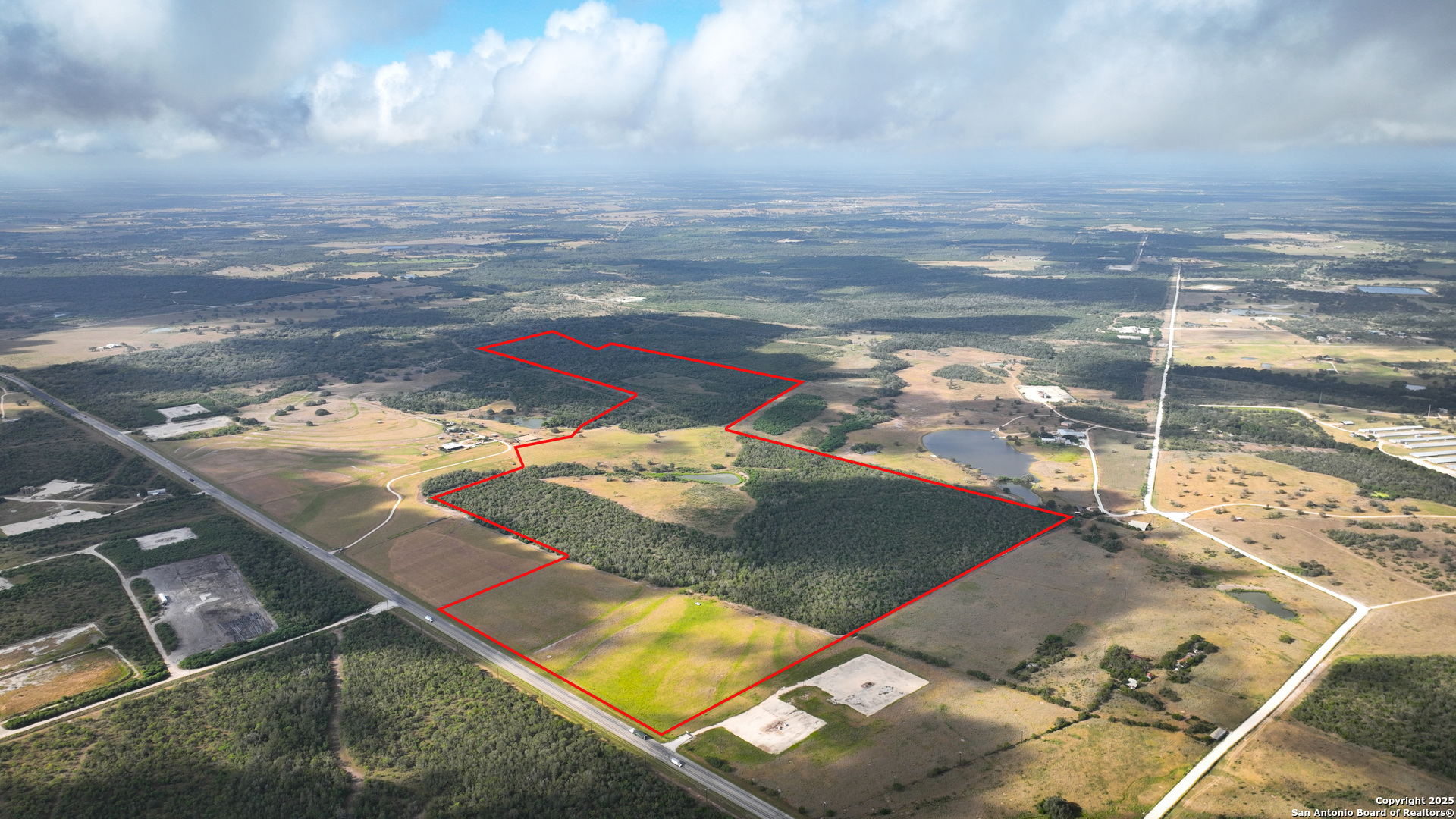 0 Tx 97 Gonzales, TX 78629 - Photo 7 of 37 an aerial view of residential houses with outdoor space