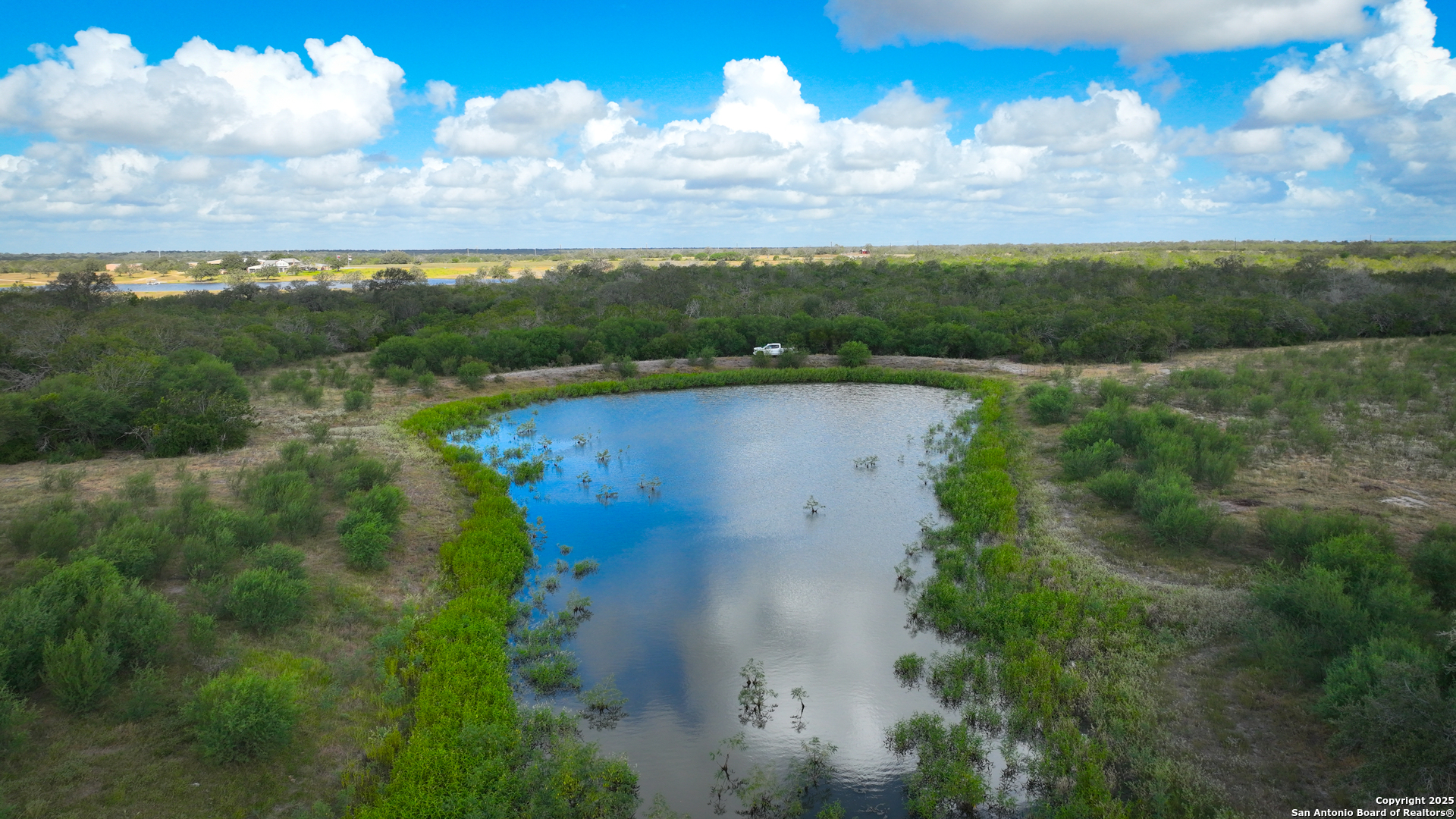 0 Tx 97 Gonzales, TX 78629 - Photo 9 of 37 an aerial view of a houses with outdoor space and street view