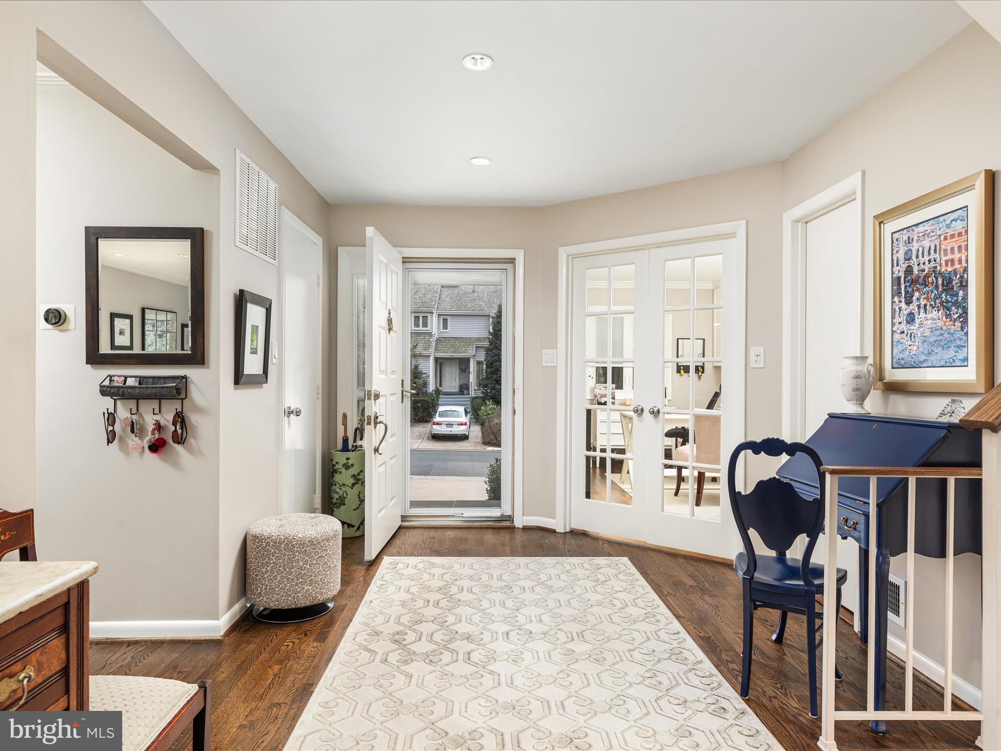 1303 Wedgewood Manor Way Reston, VA 20194 - Photo 3 of 57 Front foyer with hardwood floors thru main level