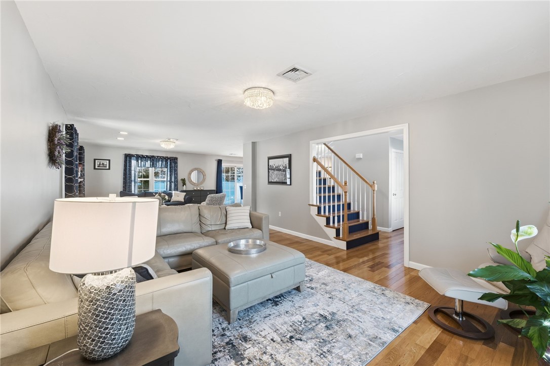 264 Round Top Road Burrillville, RI 02830 - Photo 3 of 49 front to back living/family room with gleaming hardwood floors