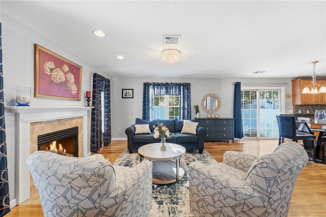 264 Round Top Road Burrillville, RI 02830 - Photo 7 of 49 cozy formal sitting room overlooking the in-ground pool with gas fireplace.