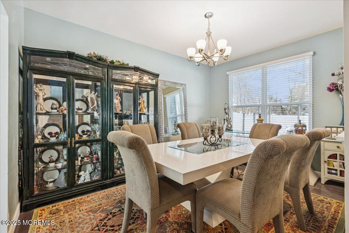 16 Longbrook Lane, Unit 16 Freehold, NJ 07728 - Photo 11 of 28 a view of a dining room with furniture window and outside view