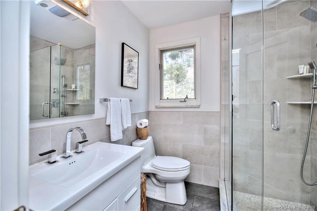 28 Narrow Rocks Road Westport, CT 06880 - Photo 21 of 35 a bathroom with a sink toilet and shower