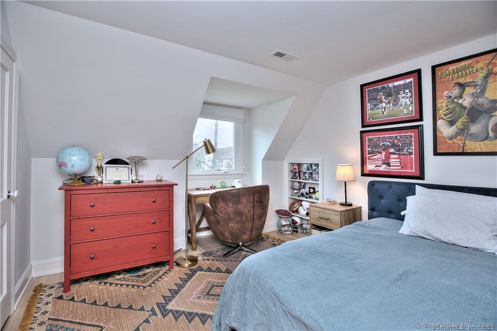 28 Narrow Rocks Road Westport, CT 06880 - Photo 26 of 35 a bedroom with a bed and furniture