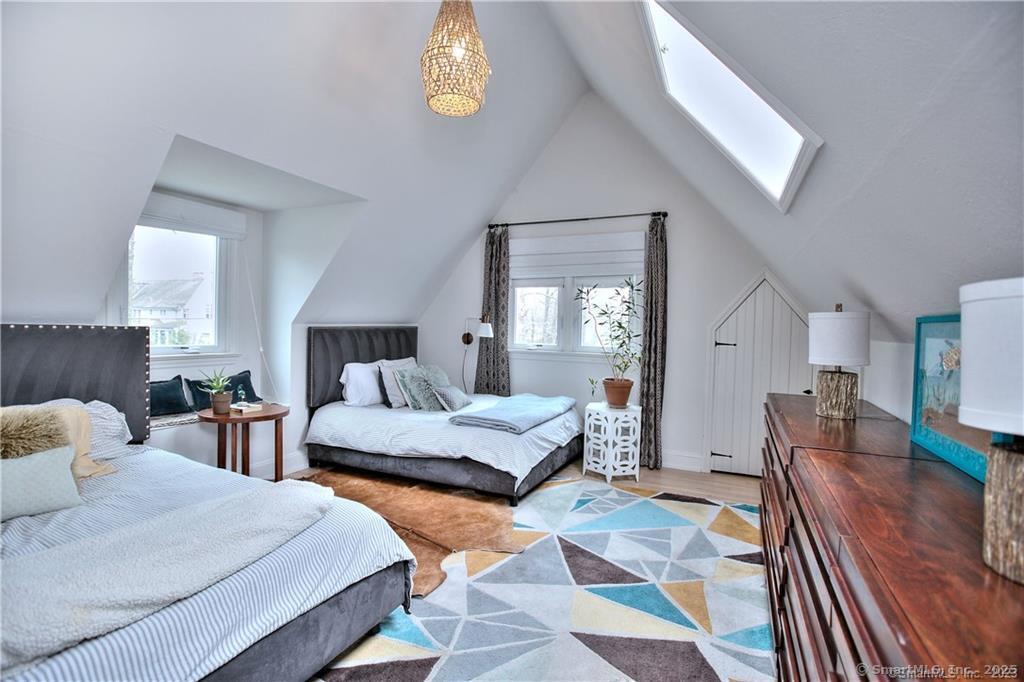 28 Narrow Rocks Road Westport, CT 06880 - Photo 28 of 35 a spacious bedroom with two beds and a lamp