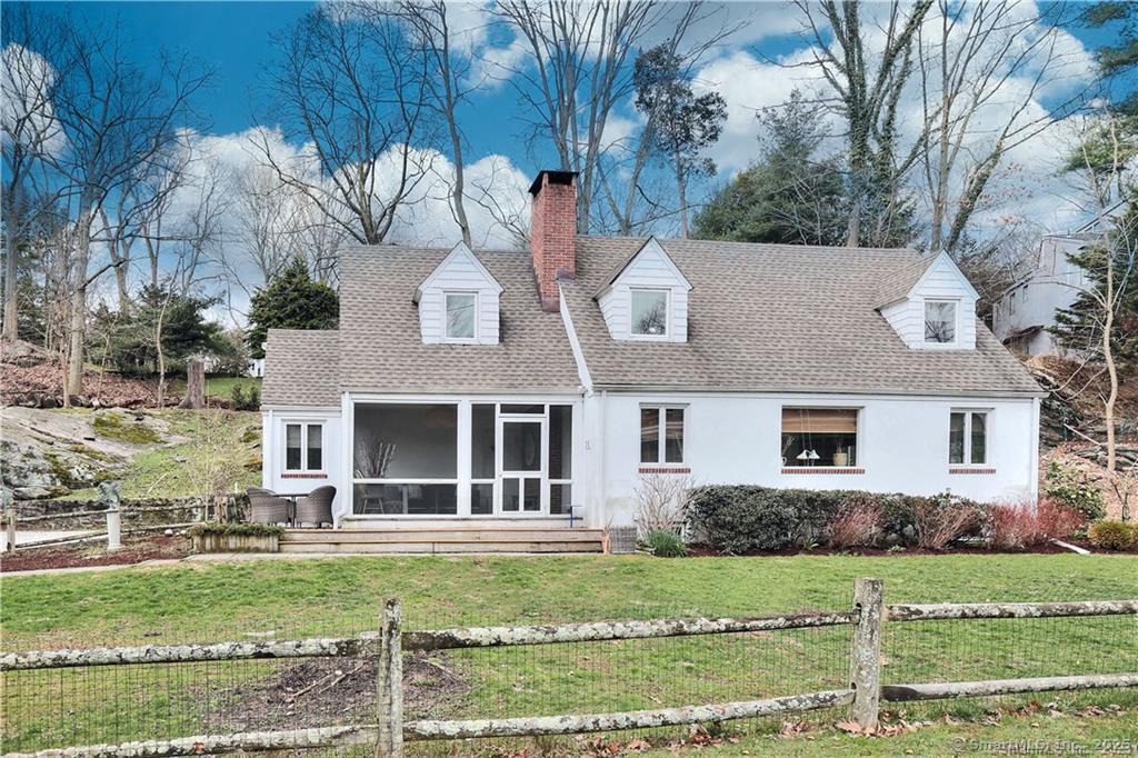 28 Narrow Rocks Road Westport, CT 06880 - Photo 29 of 35 front view of a house with a yard