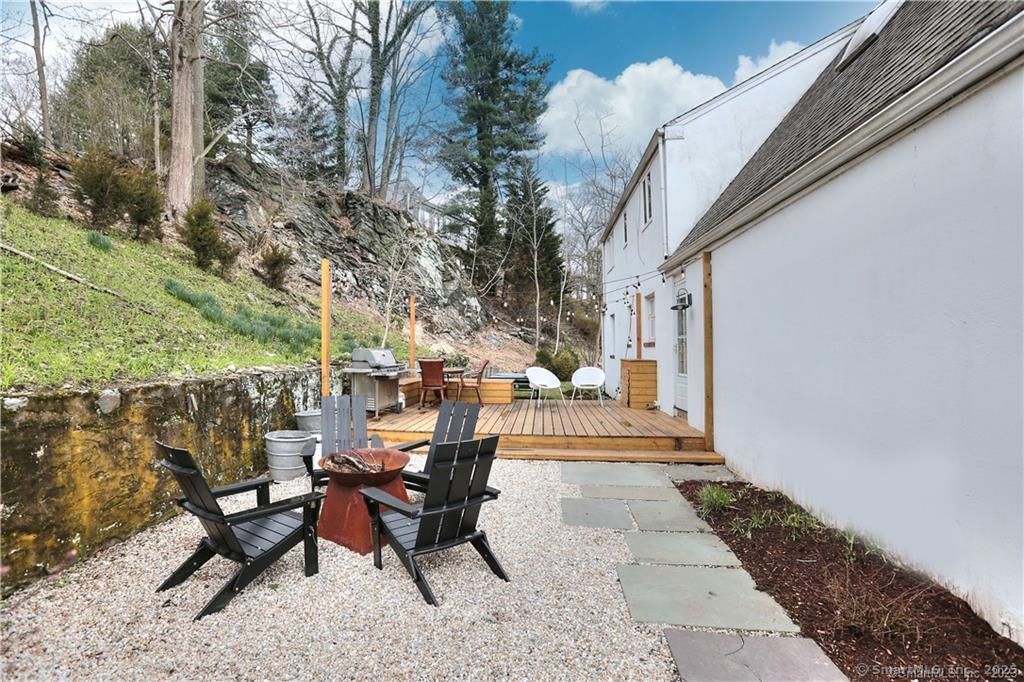 28 Narrow Rocks Road Westport, CT 06880 - Photo 35 of 35 a view of a patio with table and chairs and potted plants