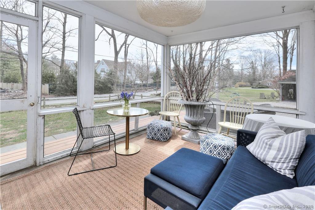 28 Narrow Rocks Road Westport, CT 06880 - Photo 4 of 35 a living room with furniture and a floor to ceiling window