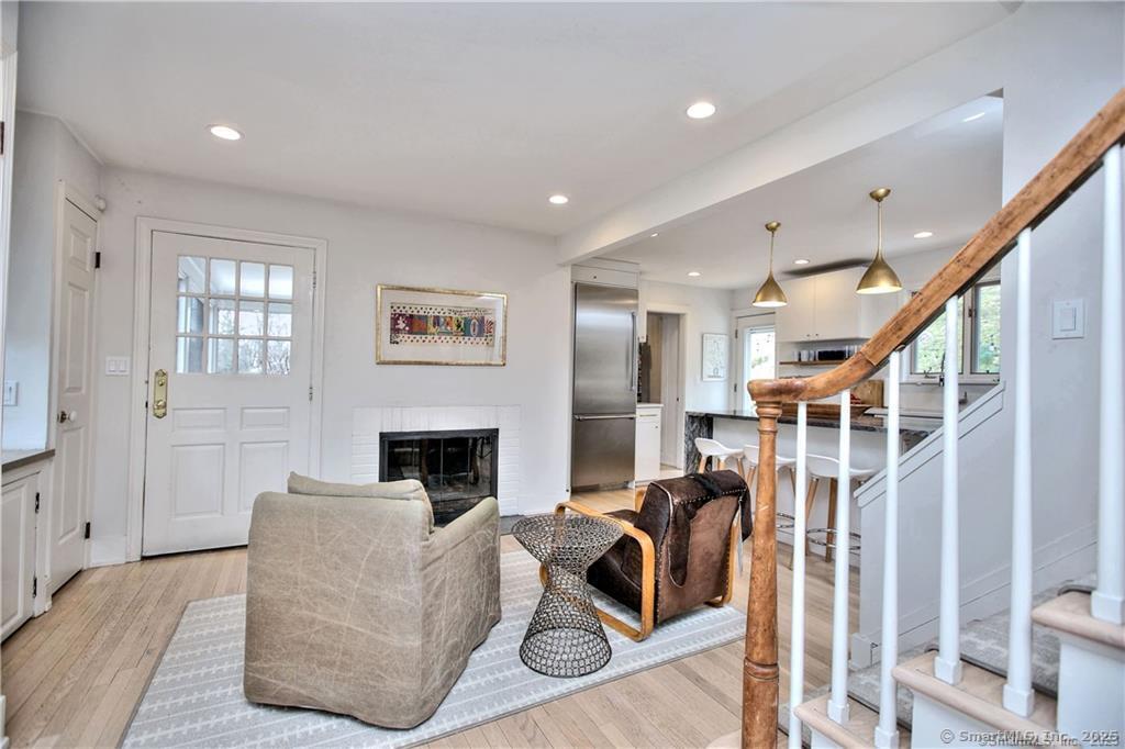 28 Narrow Rocks Road Westport, CT 06880 - Photo 6 of 35 a living room with furniture and a fireplace