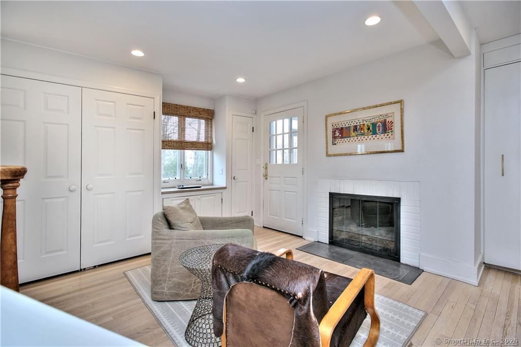 28 Narrow Rocks Road Westport, CT 06880 - Photo 9 of 35 a living room with furniture and a fireplace