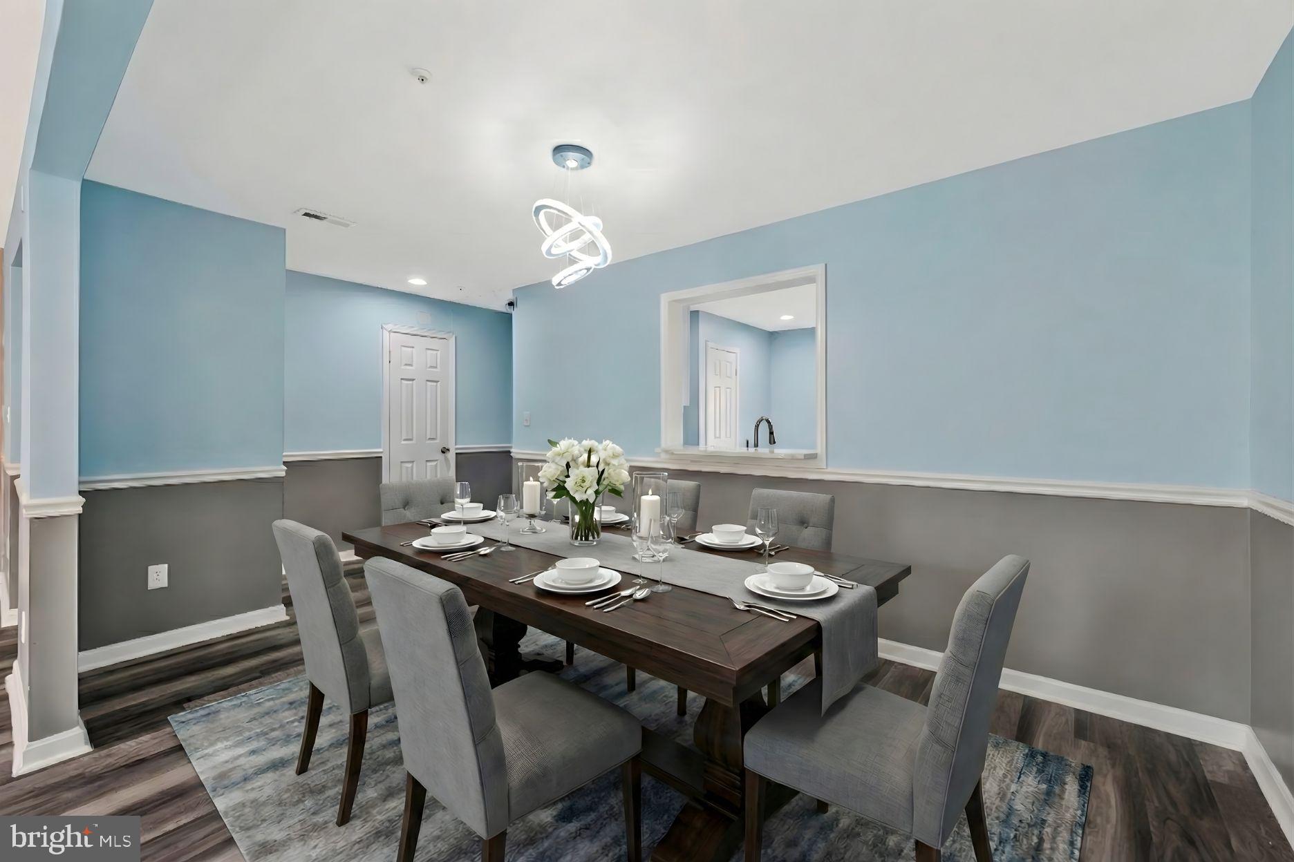4675 Red Hawk Terrace Bladensburg, MD 20710 - Photo 4 of 14 a view of a dining room with furniture and wooden floor