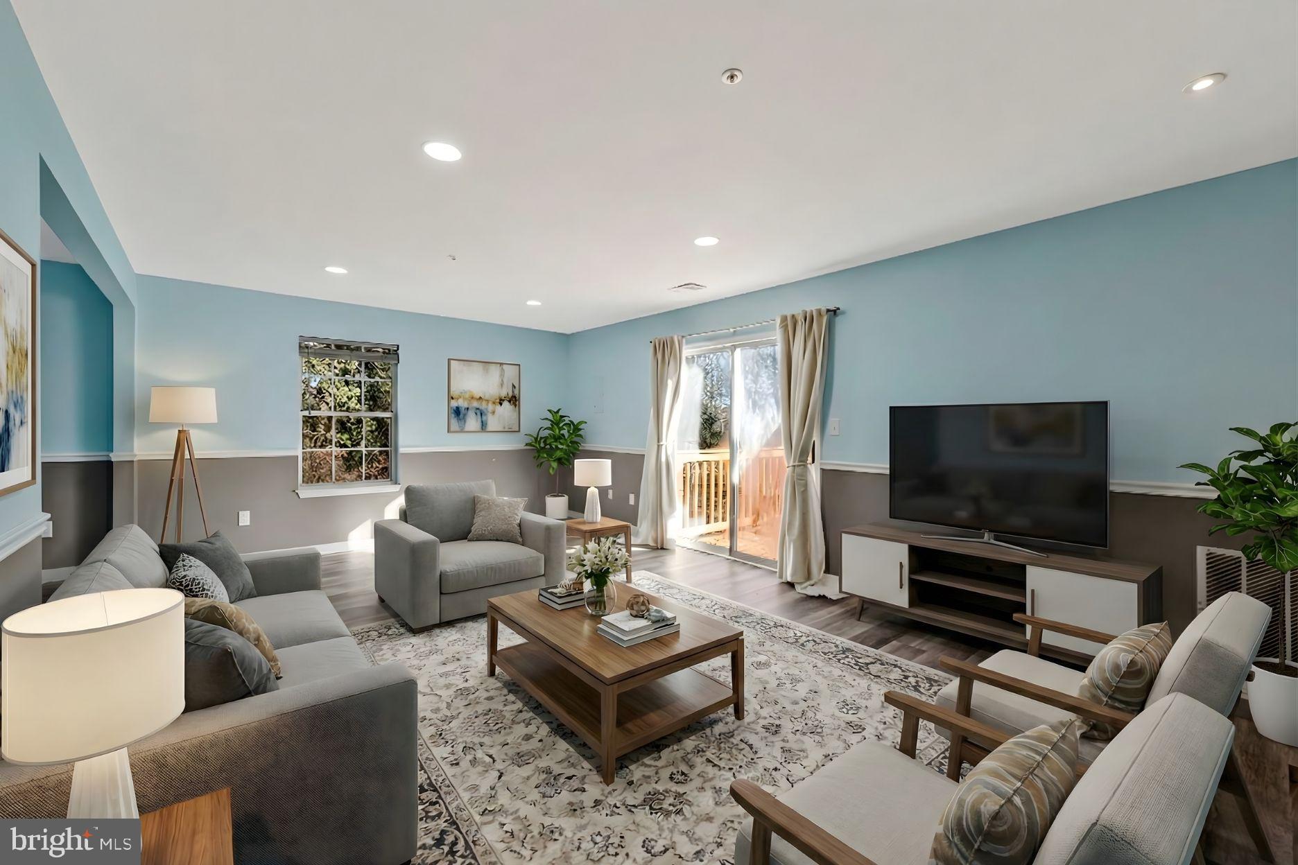 4675 Red Hawk Terrace Bladensburg, MD 20710 - Photo 5 of 14 a living room with furniture and a flat screen tv