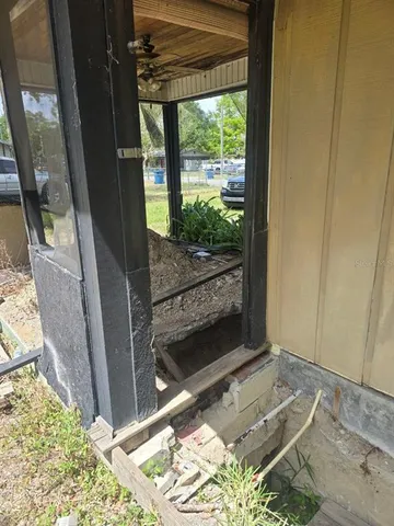a view of a refrigerator in a kitchen