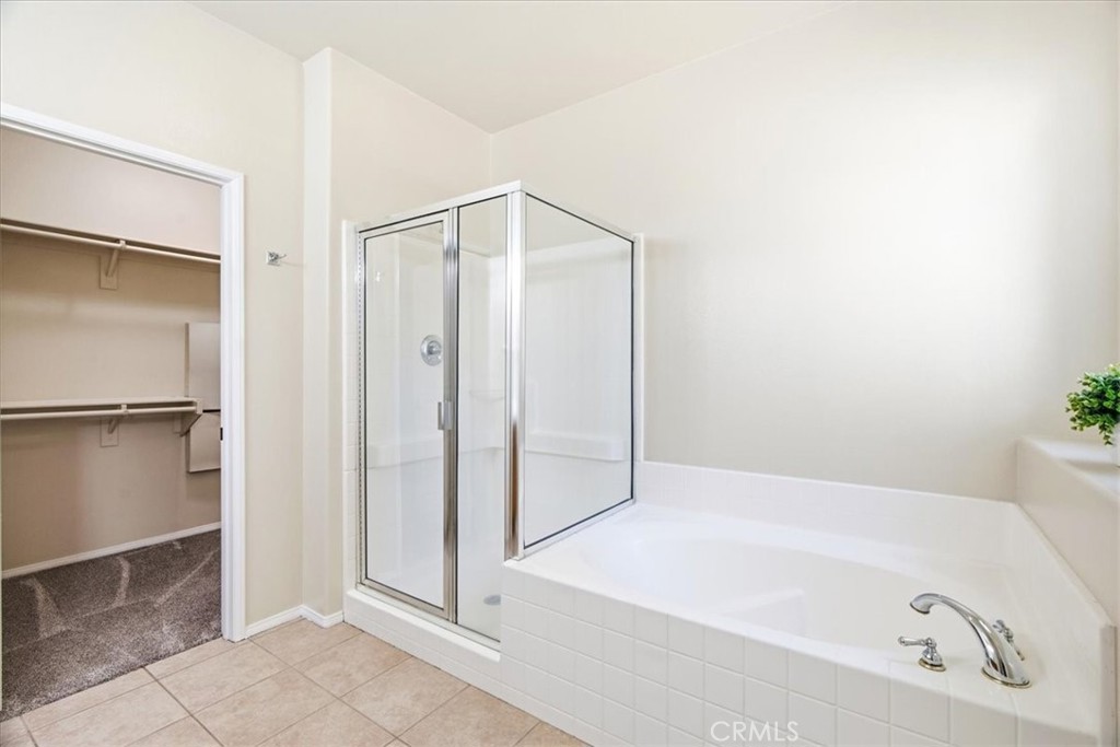 27 Whitworth Ladera Ranch, CA 92694 - Photo 31 of 33 The Master Bathroom open to walk-in closet.