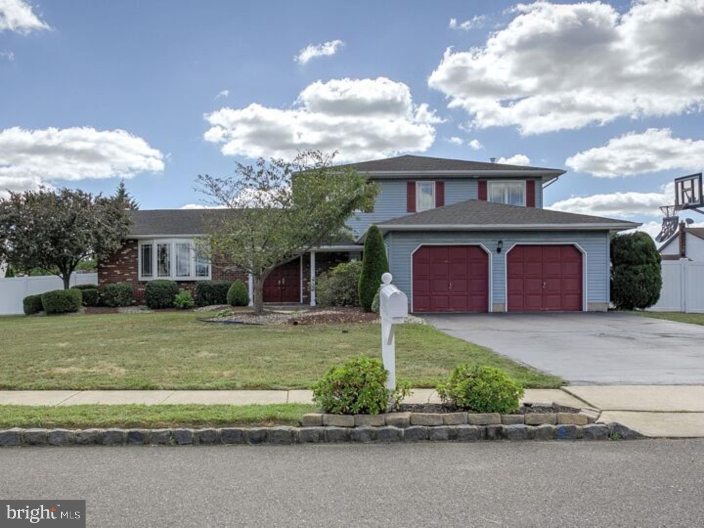 7 Baggaley Road Hamilton Square, NJ 08690 - Photo 1 of 24 a front view of a house with a garden