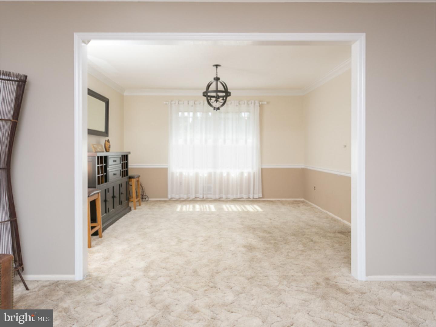 7 Baggaley Road Hamilton Square, NJ 08690 - Photo 12 of 24 a view of empty room with wooden floor and windows