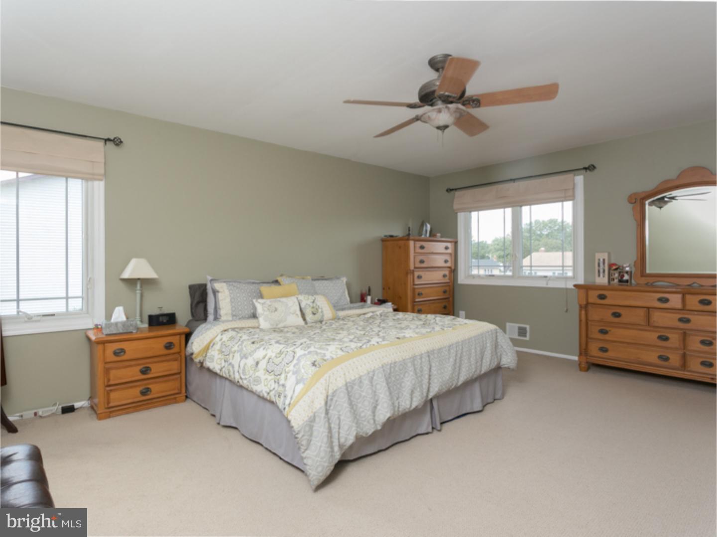 7 Baggaley Road Hamilton Square, NJ 08690 - Photo 16 of 24 a bedroom with a bed and dresser