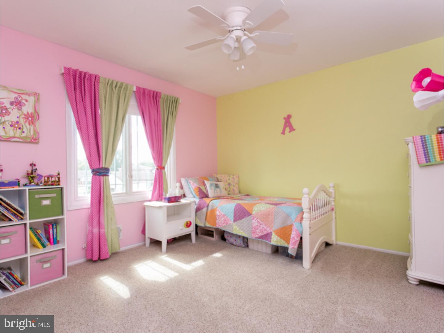 7 Baggaley Road Hamilton Square, NJ 08690 - Photo 18 of 24 a bedroom with furniture and a large window