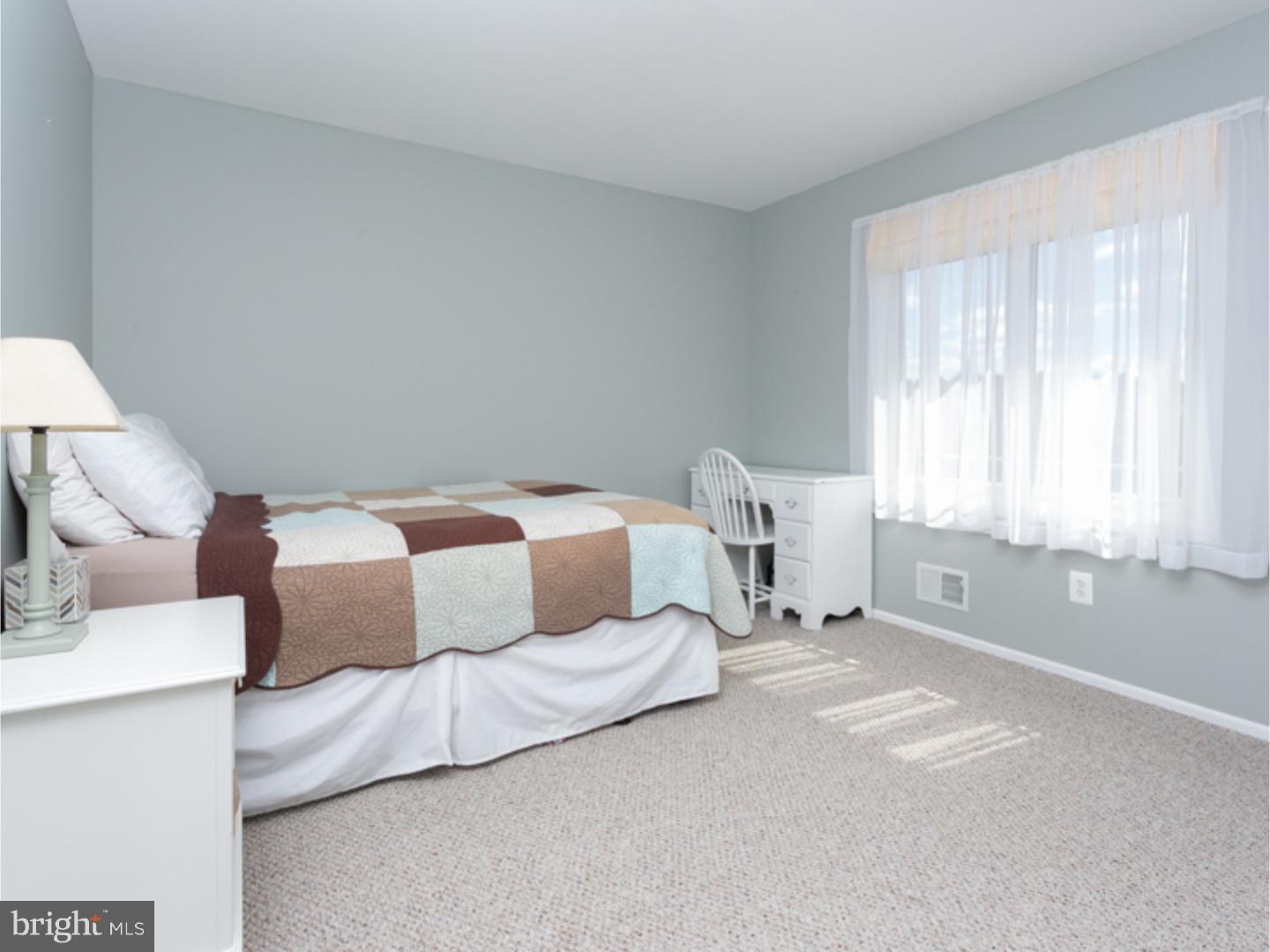7 Baggaley Road Hamilton Square, NJ 08690 - Photo 20 of 24 a bedroom with a bed and a window