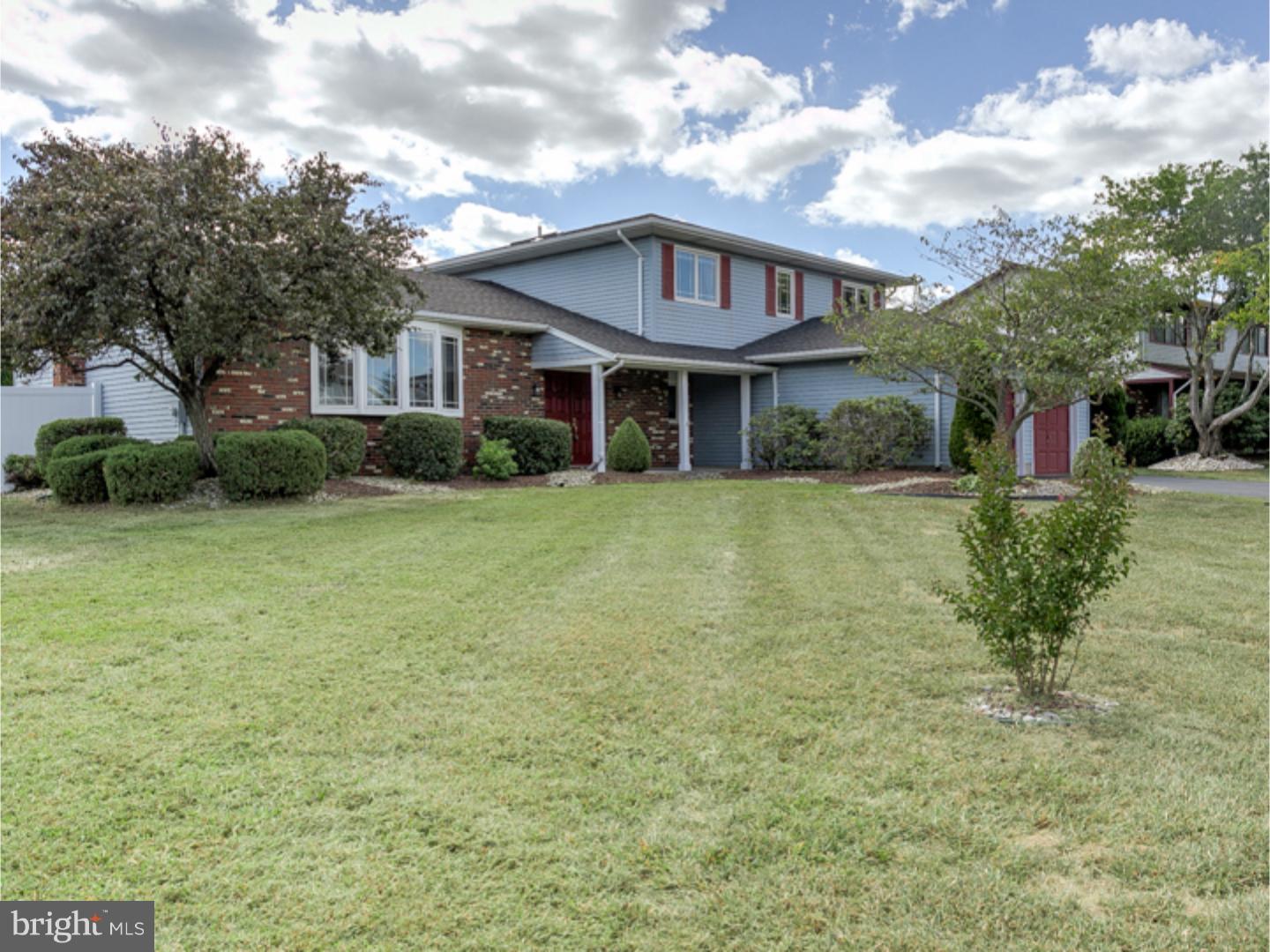 7 Baggaley Road Hamilton Square, NJ 08690 - Photo 2 of 24 a front view of a house with garden
