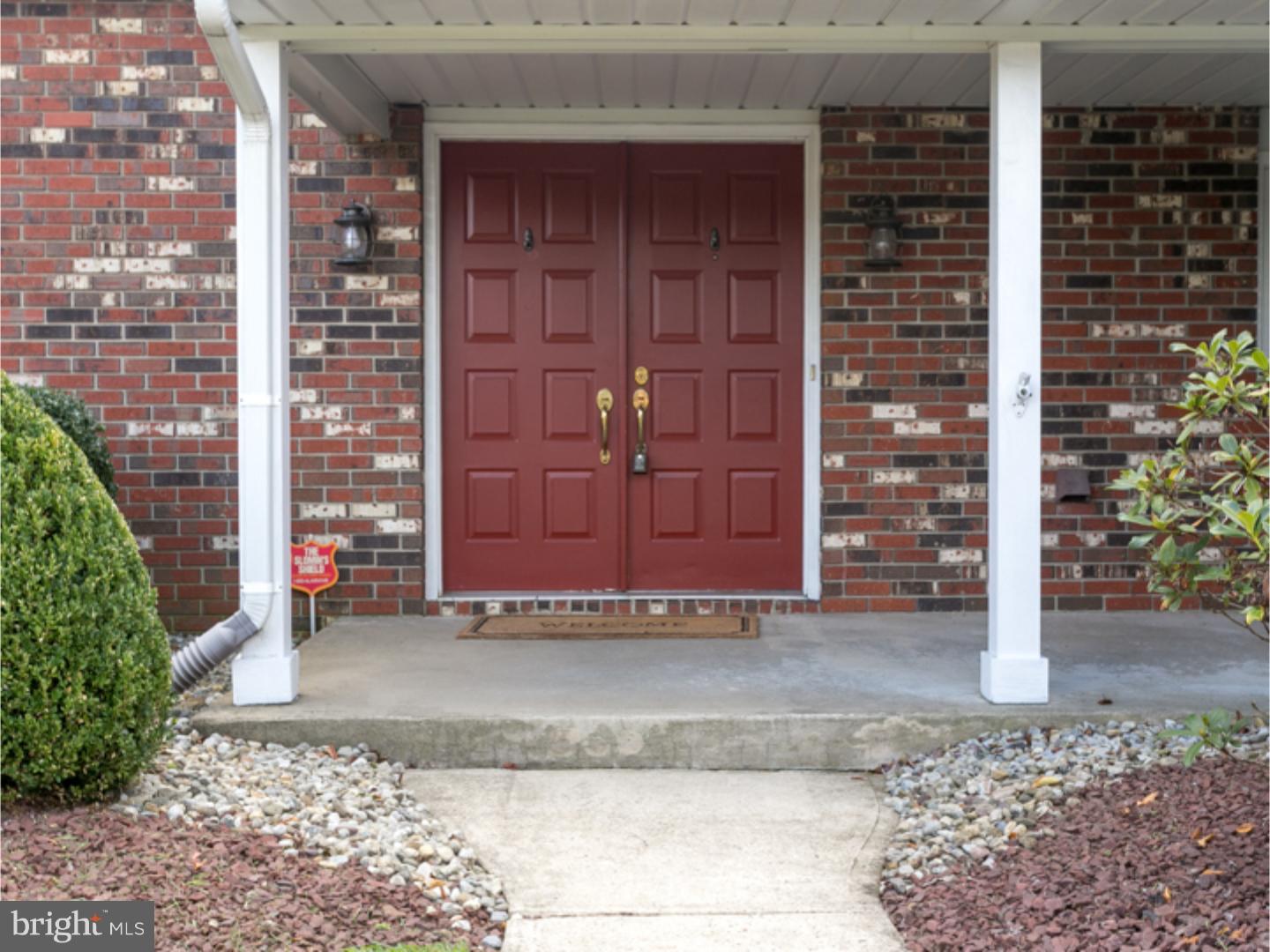 7 Baggaley Road Hamilton Square, NJ 08690 - Photo 4 of 24 a view of a wooden door and outdoor space