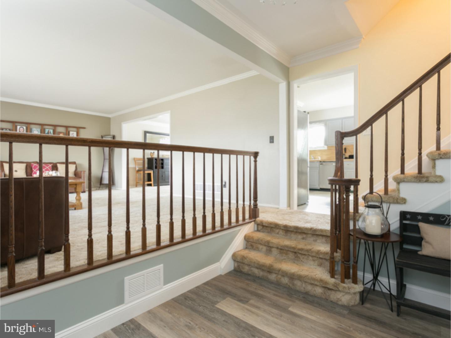 7 Baggaley Road Hamilton Square, NJ 08690 - Photo 6 of 24 a view of entryway with wooden floor and stairs