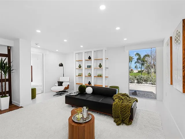 a kitchen with a table and chairs in it