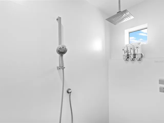 a outdoor living space with furniture and a potted plant