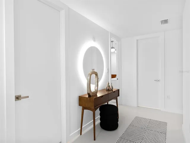 a swimming pool with outdoor seating and yard