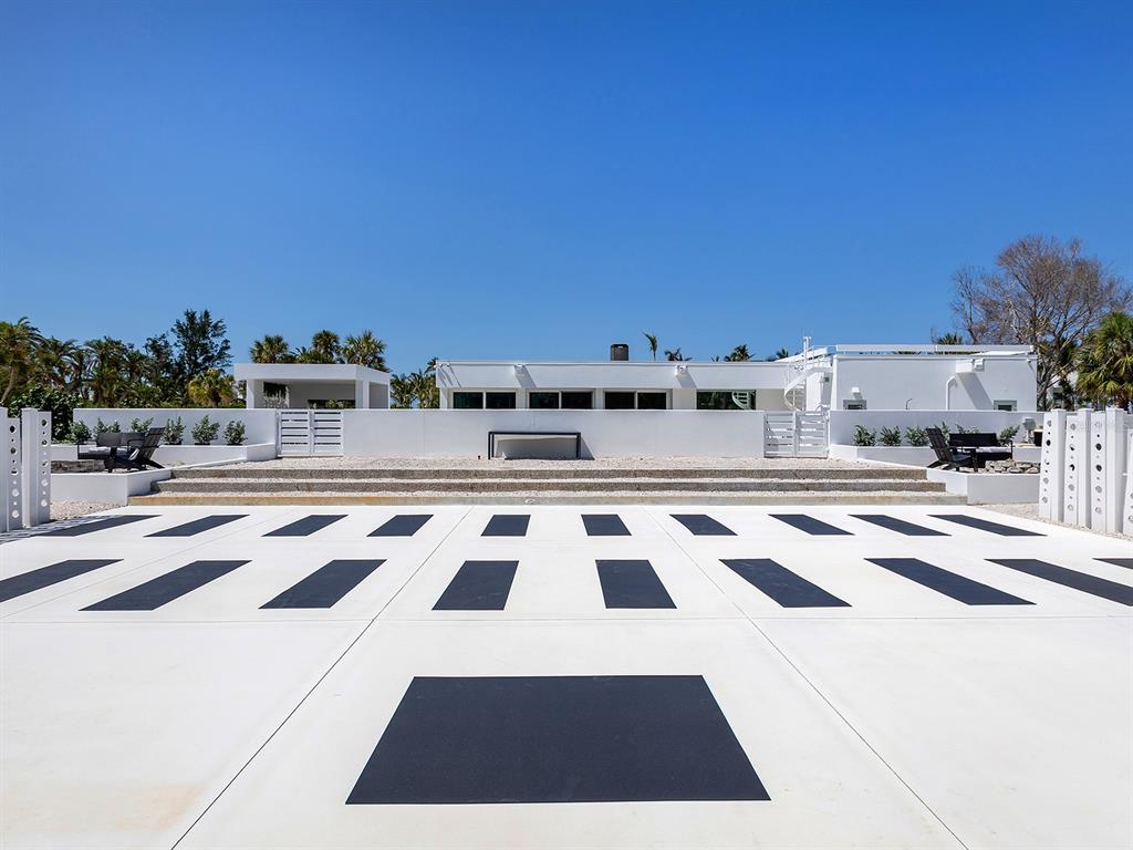 7647 Sanderling Road Sarasota, FL 34242 - Photo 54 of 75 a view of a terrace