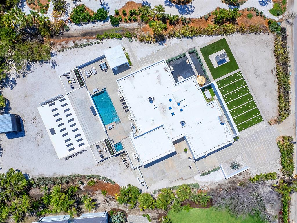 7647 Sanderling Road Sarasota, FL 34242 - Photo 63 of 75 an aerial view of a house with a yard