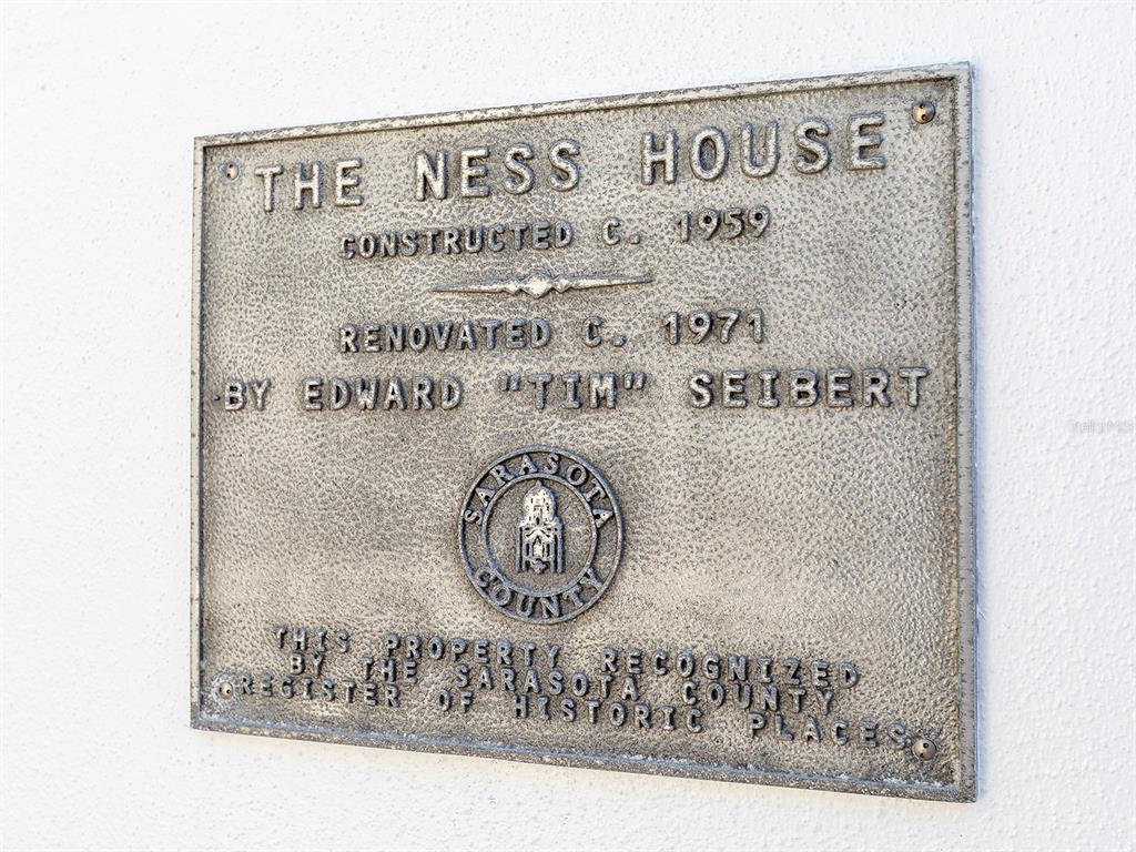 7647 Sanderling Road Sarasota, FL 34242 - Photo 67 of 75 a close up of a sign