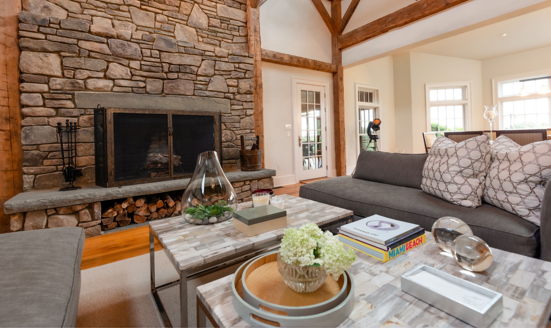 183 Polpis Road Nantucket, MA 02554 - Photo 13 of 62 a living room with furniture and a fireplace