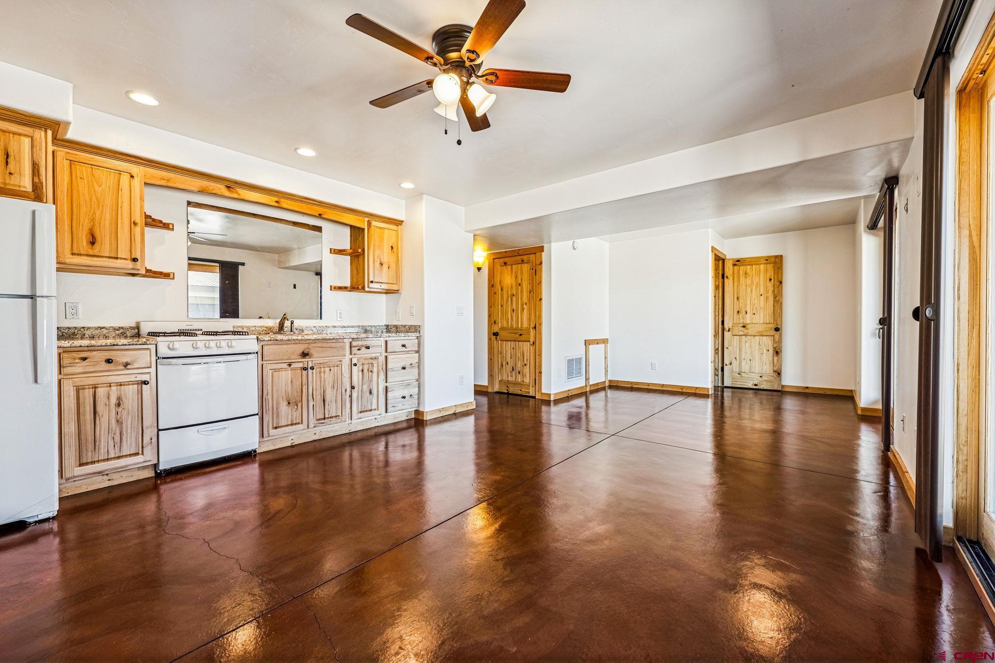 64 Summer Lane Durango, CO 81303 - Photo 14 of 25 a view of a kitchen with a sink and a window