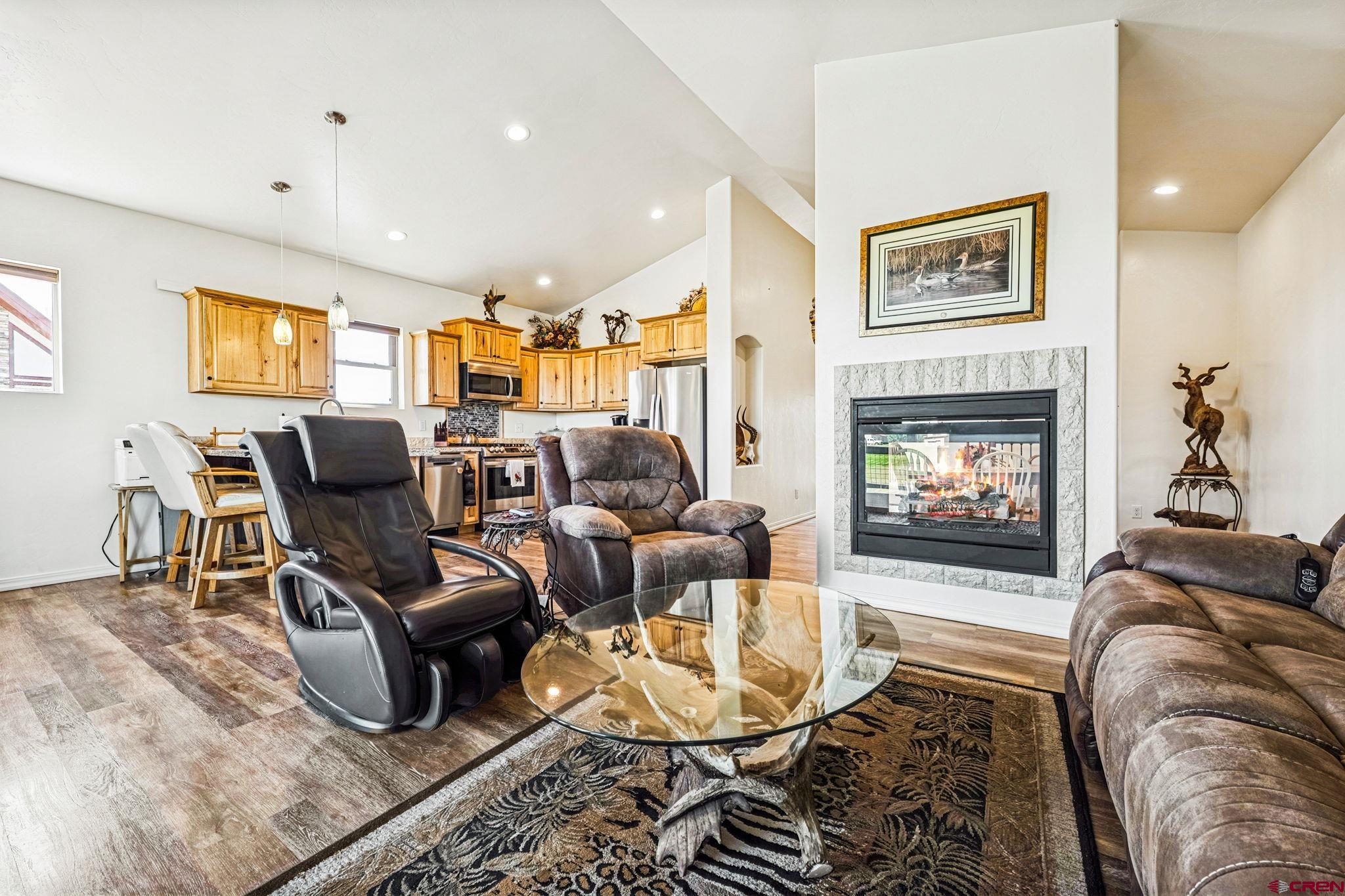 64 Summer Lane Durango, CO 81303 - Photo 19 of 25 a living room with furniture and a fireplace