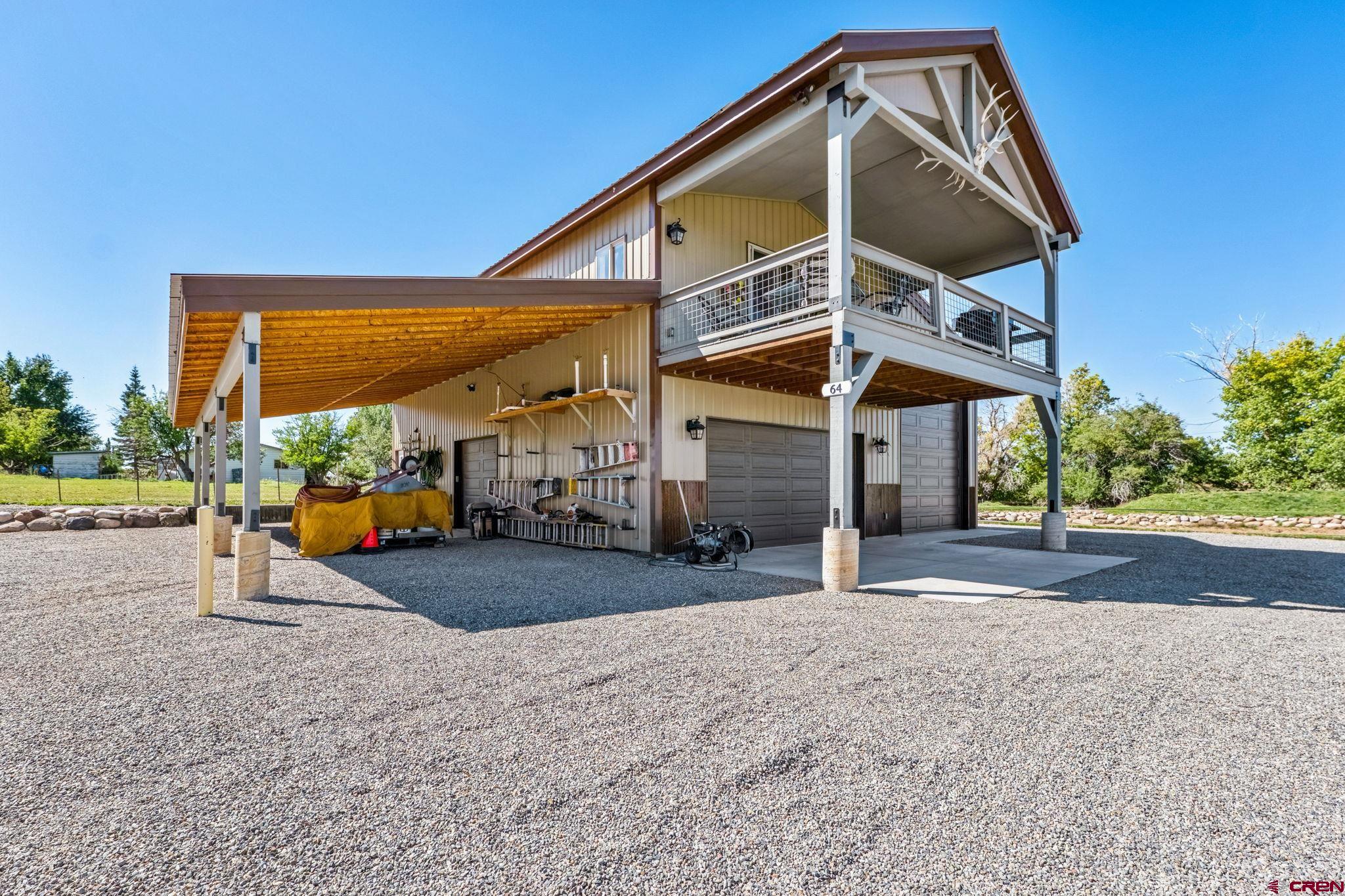 64 Summer Lane Durango, CO 81303 - Photo 4 of 25 a view of a house with a entertaining space