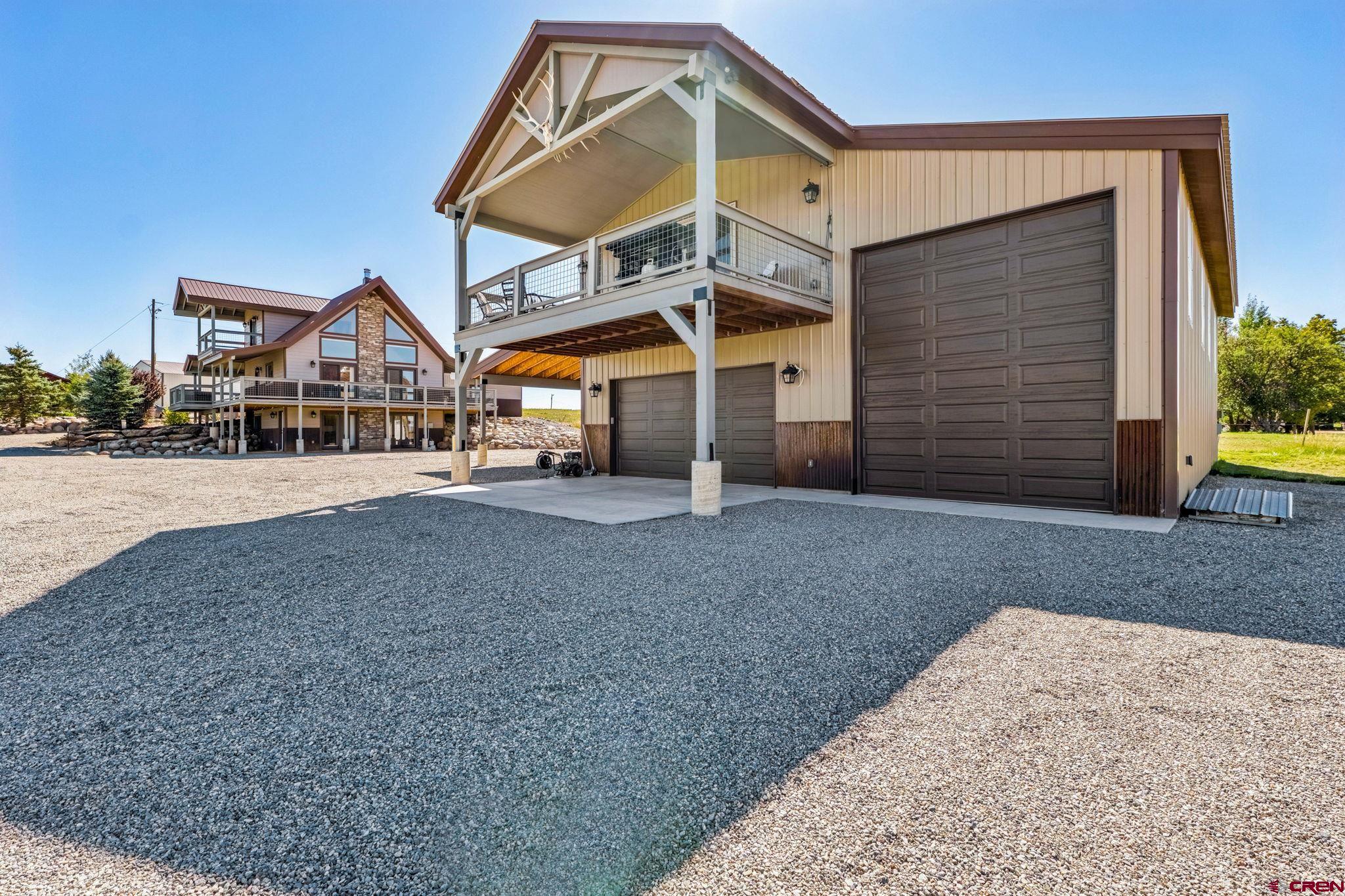 64 Summer Lane Durango, CO 81303 - Photo 5 of 25 a front view of a house with a yard