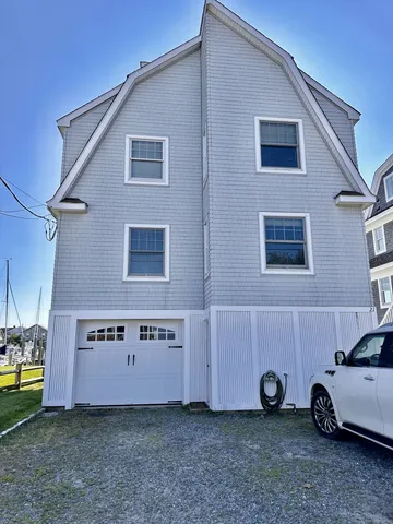 a view of a car in front of a house