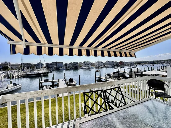 a kitchen with stainless steel appliances a sink and cabinets