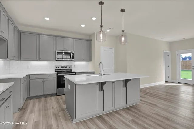 $384,990 | 805 Red Sky Drive Northeast, Winnabow, NC 28479