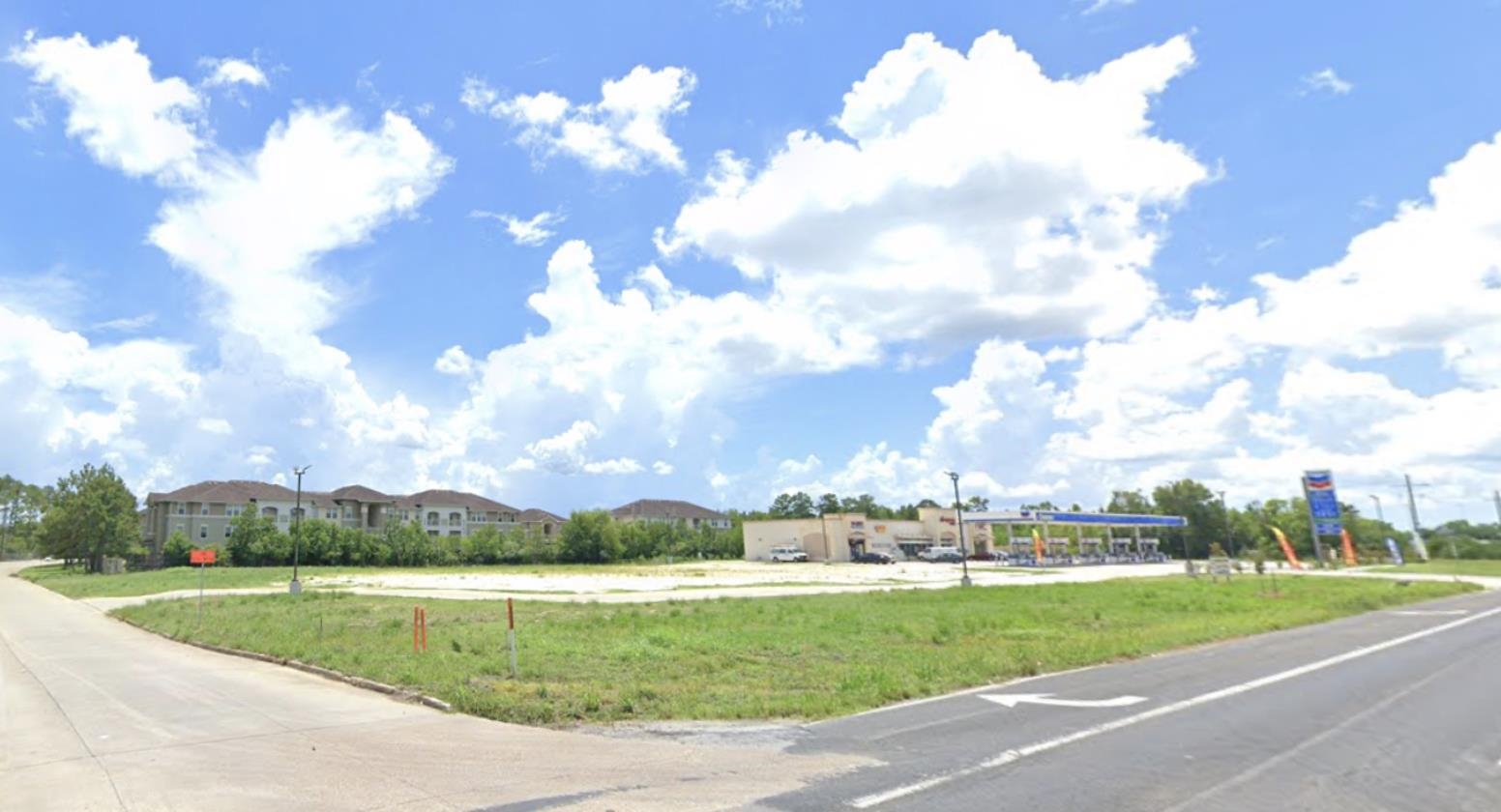 8190 Eastex Freeway Beaumont, TX 77708 - Photo 6 of 12 a view of a house with a big yard and a large tree