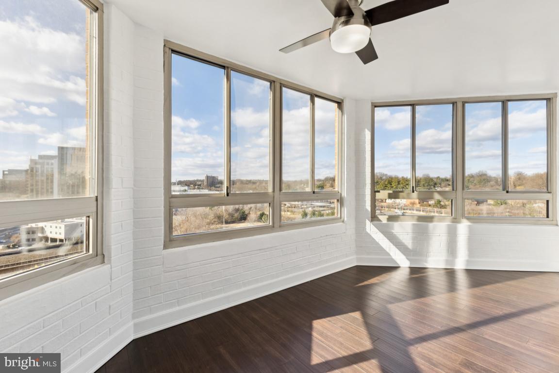 2151 Jamieson Avenue, Unit 1002 Alexandria, VA 22314 - Photo 13 of 25 a view of empty room with wooden floor and fan